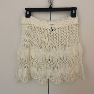 Super cute skirt/bathing suit cover. Cream colored. Never worn.